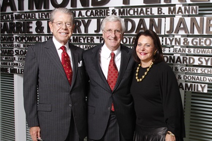 In a photo taken at the opening of the Perelman Center for Advanced Medicine in 2008, John Glick, MD, emeritus professor, poses with Lyn and the late George M. Ross